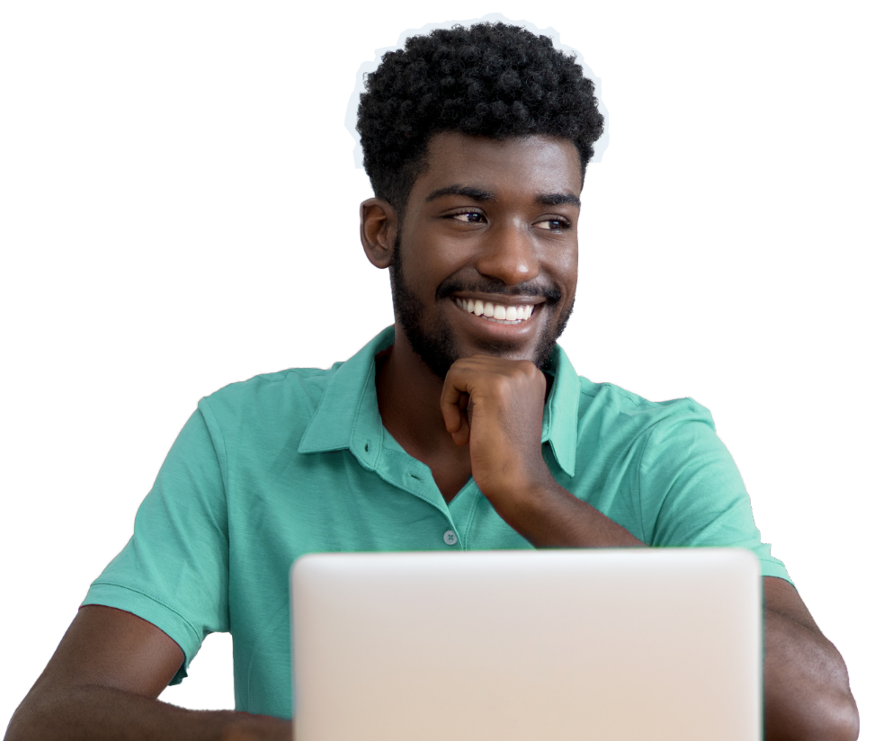 Guy smiling on laptop